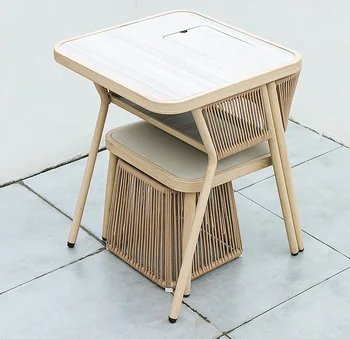 Маленькие столики и стулья для балкона, современный минималистичный чайный столик для отдыха небольшого размера, водонепроницаемые роскошные стулья из ротанга.